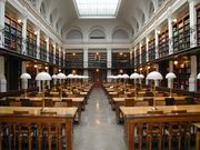 AI Research | Verified Journalism Press Graz University Library reading room illustrating research into AI and peer review.