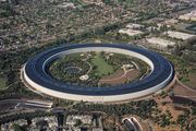 Apple Park | Verified Journalism Press Aerial view of Apple Park is shown alongside discussion of quantum physics research.