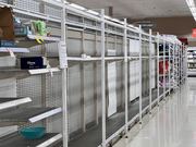 Australia Inequality | Verified Journalism Press Empty supermarket shelves in Brisbane during the COVID-19 pandemic illustrate economic inequality.