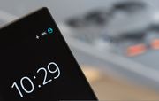 Reddit Fine | Verified Journalism Press A smartphone screen displays content related to a recent fine levied against Reddit, relevant to human rights issues.
